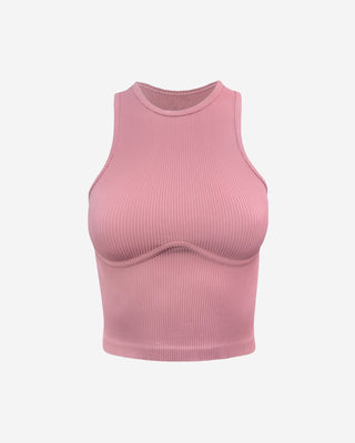 Blush pink sleeveless ribbed crop top featuring a high neck, curved bust seams, and a flattering body-contouring fit