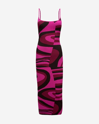 A pink maxi dress with a geometric print, featuring adjustable straps and a slit on the back.