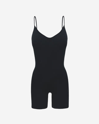 Black ribbed knit romper for women featuring a scoop neck, slim spaghetti straps, body-contouring fit, and comfortable stretch fabric with fitted shorts design