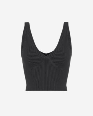 Front view of a black ribbed V neck crop top with thick straps, sculpted panel stitching, and a flattering body hugging fit.
