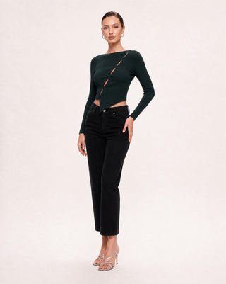 Women’s dark green long sleeve cutout top with asymmetric button front, styled with black jeans and heels for a chic going-out, date night, and elevated evening look