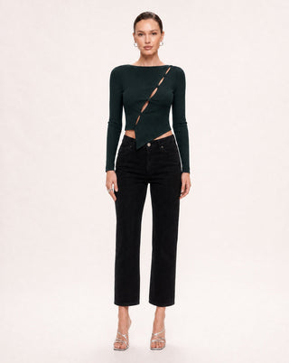 Women’s fitted dark green long sleeve top with diagonal cutout button detail and asymmetric hem, paired with black denim for trendy nightlife, dinner, and date night style