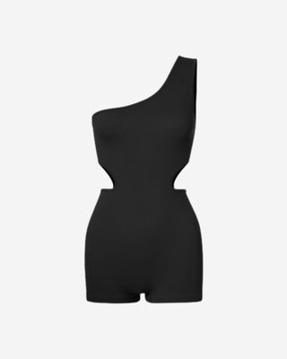 Black ribbed one shoulder cutout romper with asymmetric neckline, side waist cutouts and fitted biker shorts, a statement women’s one-piece for nights out, vacations, festivals and summer styling.