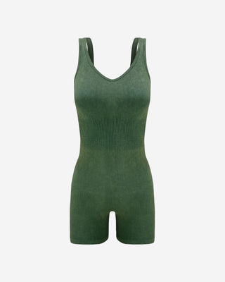 Olive green ribbed sleeveless romper with V-neckline, wide straps and fitted shorts, a versatile women’s one-piece for summer, vacation, travel, layering and everyday wear.