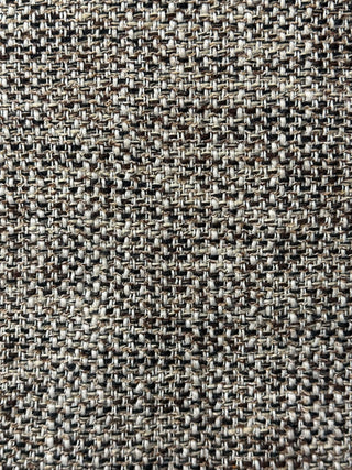 Up close shot of the caro two piece set's tweed fabric.