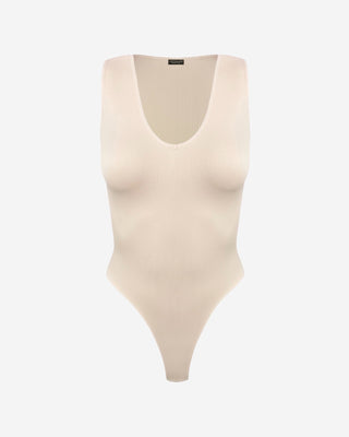Front view of a buff-colored ribbed sleeveless bodysuit featuring a scoop neckline, contoured shape, and soft stretch construction.