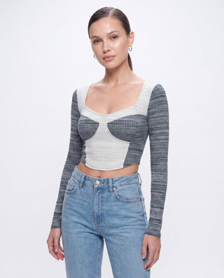 Women’s blue and white colorblock long sleeve crop top with square neckline, styled with light wash jeans for a trendy casual, brunch, date night, and everyday outfit