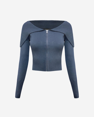 Dark blue zip up long sleeve sweater.