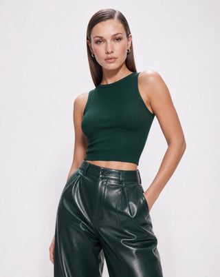 Women’s dark green ribbed sleeveless crop top with high crew neckline, styled with faux leather pants for elevated streetwear, date night and going-out looks.