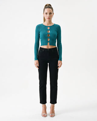 Women’s teal long sleeve ribbed cutout crop top styled with black straight-leg jeans and silver heels for a trendy night-out outfit, dinner look, city style and elevated casual wear.