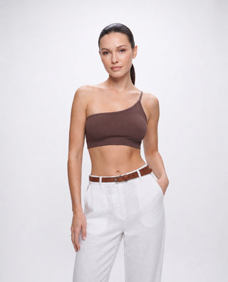 Women’s brown asymmetrical one shoulder brami crop top with ribbed seamless fit, styled for brunch, travel, resort wear and effortless everyday outfits.