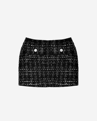 Black and white plaid mini skirt with gold and pearl decorative buttons on the front.
