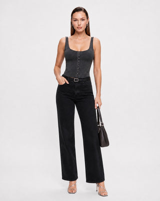 Women's fitted charcoal gray corset top featuring wide tank straps, scoop neckline, and front hook and eye detail paired with black high waisted jeans