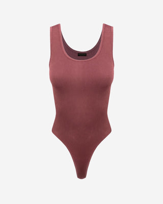 A red, dye washed, ribbed fabric bodysuit with a round neckline and smooth, buttery feel.