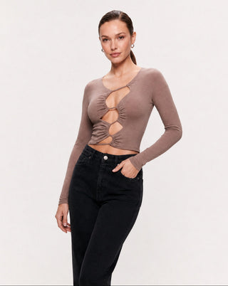 Metalux Mezra cutout crop top in brown, featuring a stylish design with cutout details and a fitted silhouette.