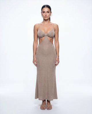 Women's neutral beige cutout maxi dress with a twist front bodice, fitted silhouette, and elegant floor-length design