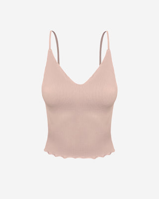 Blush pink ribbed cami top for women featuring adjustable spaghetti straps, a flattering V-neckline, seamless stretch construction, and a fitted silhouette
