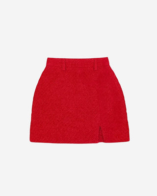 Red boucle tweed mini skirt for women featuring a structured silhouette, textured woven fabric, and sophisticated tailored design