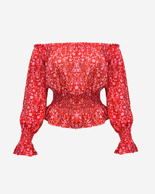 Red and pink chiffon smocked crop top with long sleeves.