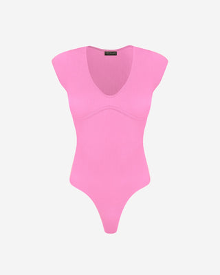 A pink ribbed bodysuit with a V-neckline and snap button closure, designed for layering or wearing on its own.
