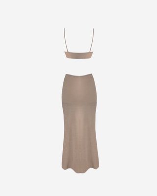 Sand beige sleeveless maxi dress featuring a twist front neckline, waist cutouts, and a flattering fitted shape