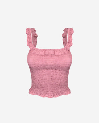 Blush pink sleeveless smocked top featuring ruffled straps, a square neck, and an elastic shirred bodice for a comfortable flattering fit