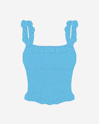 Front view of a women’s smocked tank top highlighting the square neckline, ruffled trim, and stretchy textured fabric.