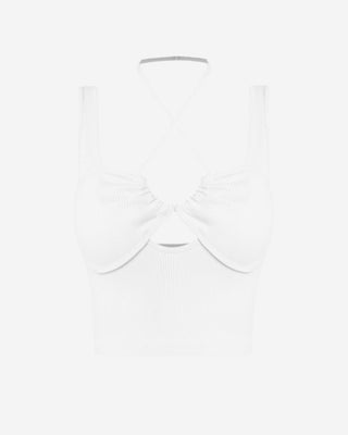 White ribbed crop top for women featuring a halter neckline, front keyhole cutout, contour seam detailing, and a fitted cropped silhouette for elevated everyday styling